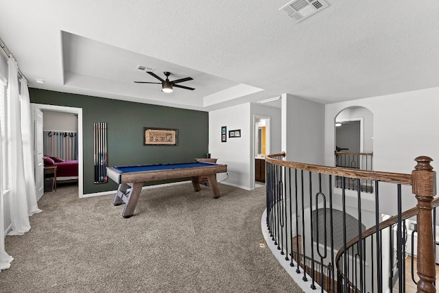 rec room with carpet, a tray ceiling, and pool table