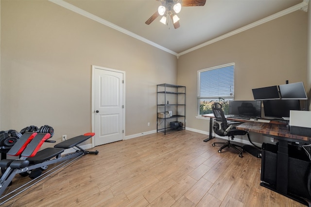 office featuring crown molding, light hardwood / wood-style flooring, and ceiling fan