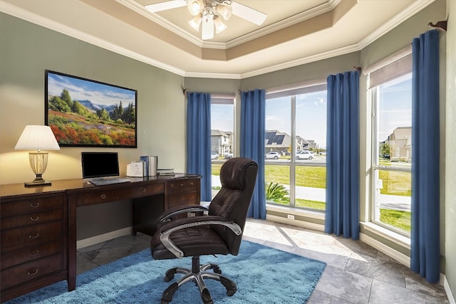 office with ceiling fan, ornamental molding, and a tray ceiling