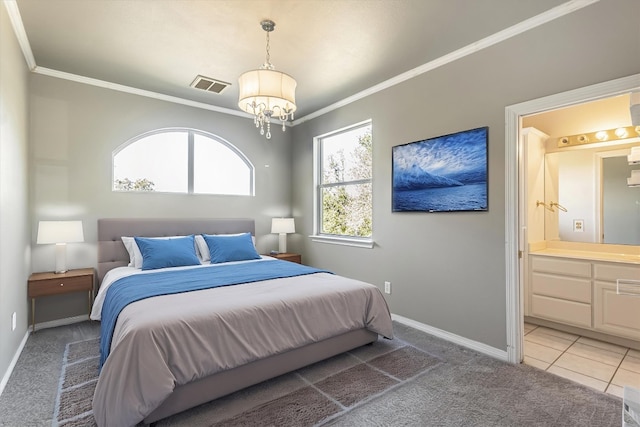 bedroom featuring crown molding, a notable chandelier, ensuite bath, and carpet floors