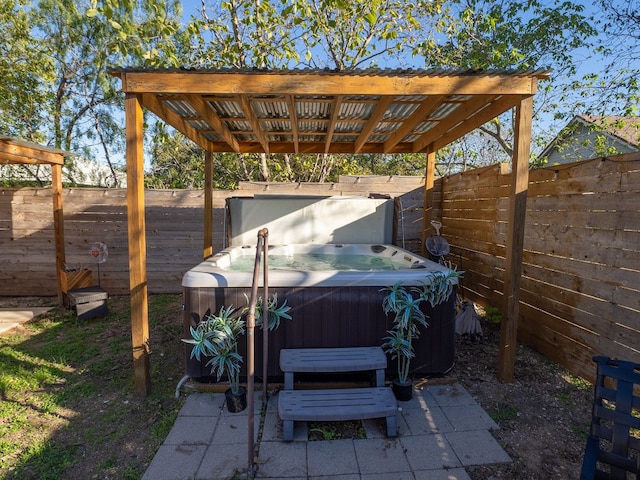 view of patio featuring a hot tub