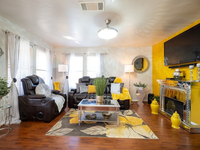 living room featuring dark hardwood / wood-style flooring