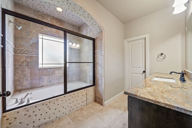 bathroom featuring tile patterned floors, vanity, and shower / bath combination with glass door