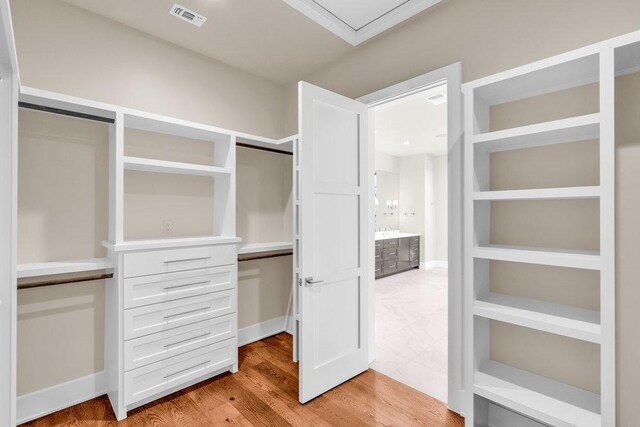 4312 Amarra Dr, Austin, TX 78735 - spacious closet with light wood-style floors and visible vents