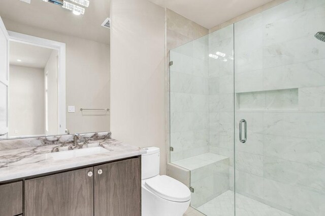 4312 Amarra Dr, Austin, TX 78735 - full bath featuring toilet, vanity, visible vents, and a shower stall