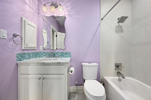 full bathroom featuring vanity, toilet, and washtub / shower combination