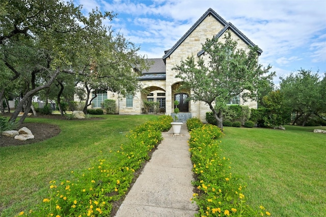 view of front of home featuring a front lawn