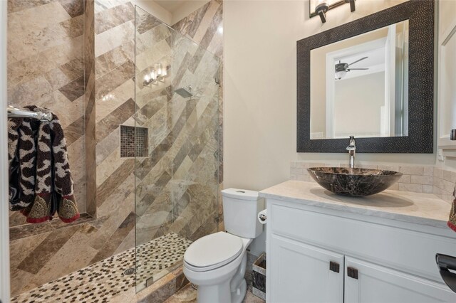 12920 Zen Gardens Way, Austin, TX 78732 - bathroom featuring vanity, a stall shower, and ceiling fan