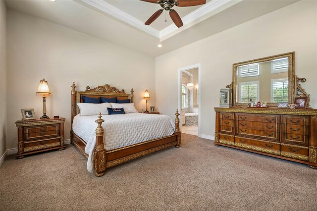 12920 Zen Gardens Way, Austin, TX 78732 - carpeted bedroom with a raised ceiling, ensuite bath, recessed lighting, and crown molding