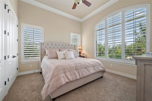 12920 Zen Gardens Way, Austin, TX 78732 - bedroom with carpet floors, crown molding, multiple windows, and a ceiling fan