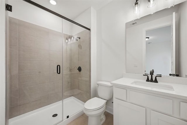 1205 Summer Moon Dr, Georgetown, TX 78628 - full bath featuring a stall shower, toilet, baseboards, and vanity