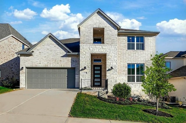 1205 Summer Moon Dr, Georgetown, TX 78628 - french country style house with driveway, brick siding, a garage, cooling unit, and stone siding