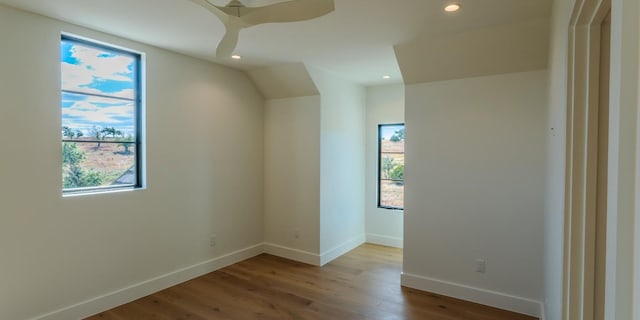 bonus room featuring ceiling fan, recessed lighting, light wood-style flooring, and baseboards