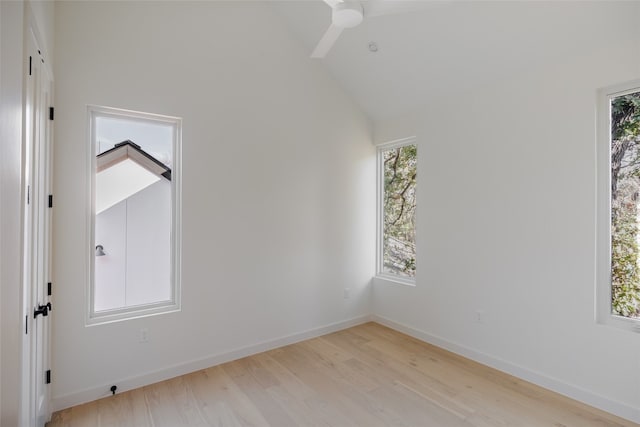 additional living space featuring ceiling fan, light hardwood / wood-style flooring, and high vaulted ceiling