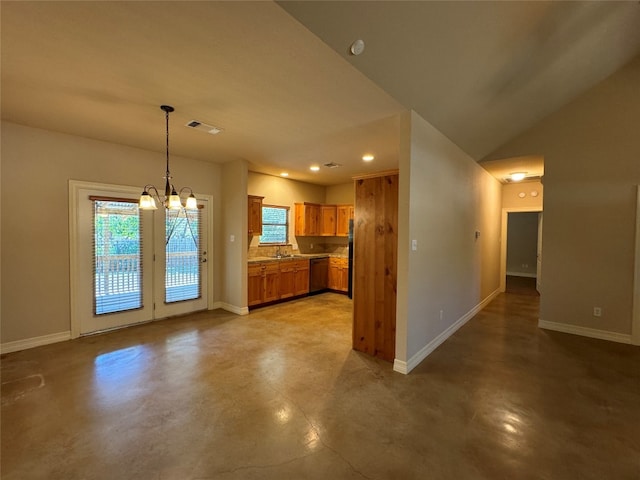 kitchen featuring dishwashing machine, sink, hanging light fixtures, and a chandelier