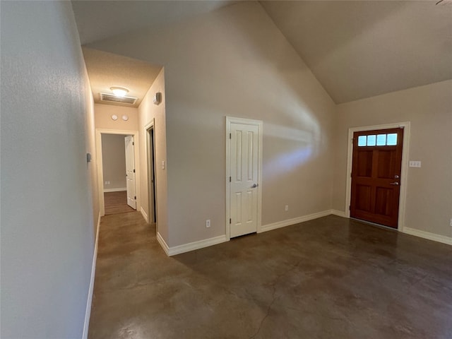 entryway with high vaulted ceiling