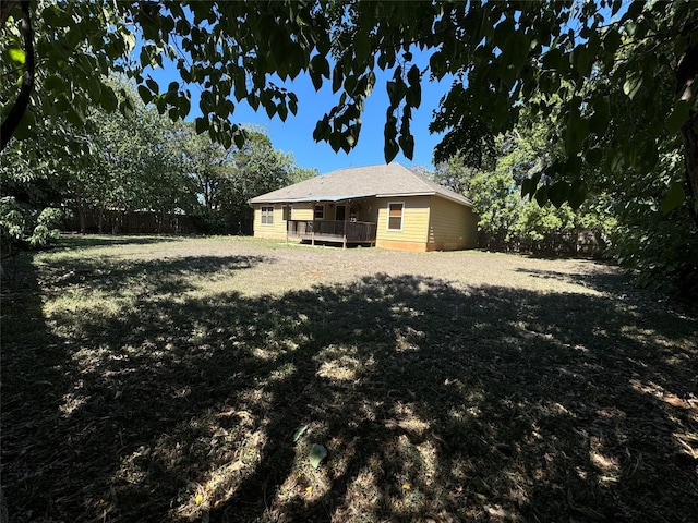 view of yard featuring a wooden deck