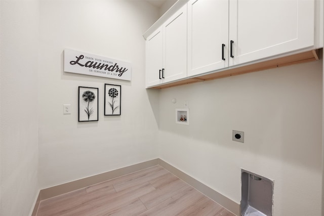 laundry area with cabinets, washer hookup, light wood-type flooring, and hookup for an electric dryer