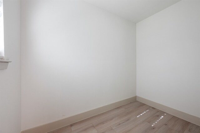 empty room featuring light hardwood / wood-style floors