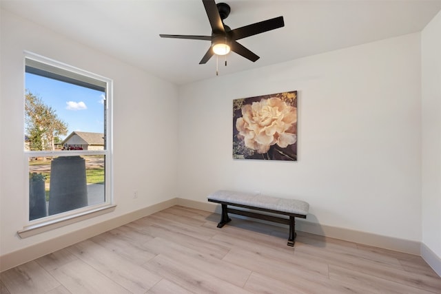 unfurnished room with ceiling fan and light hardwood / wood-style floors