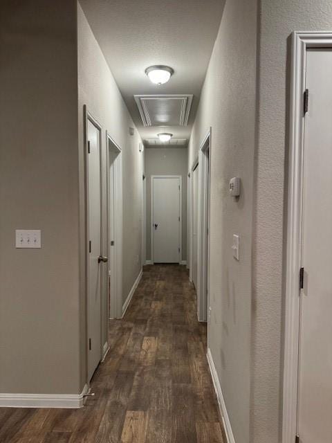 hallway featuring dark hardwood / wood-style floors