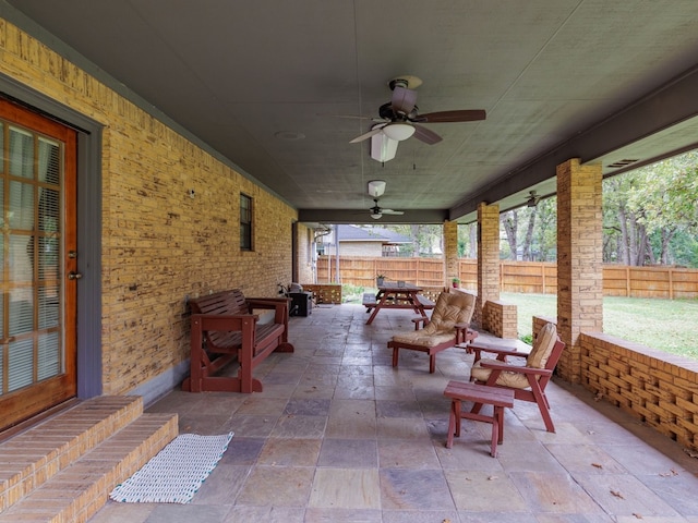 view of patio / terrace featuring ceiling fan