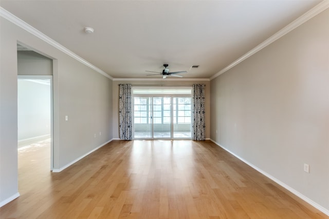 spare room featuring light hardwood / wood-style flooring, ceiling fan, and crown molding