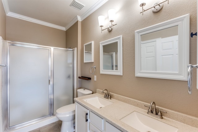 bathroom featuring tile patterned floors, ornamental molding, vanity, toilet, and a shower with shower door