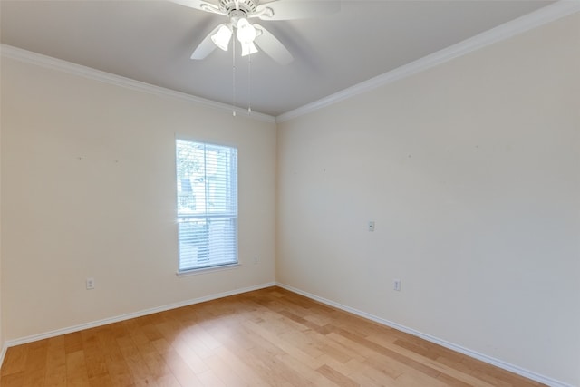 empty room featuring ceiling fan, light hardwood / wood-style flooring, and ornamental molding