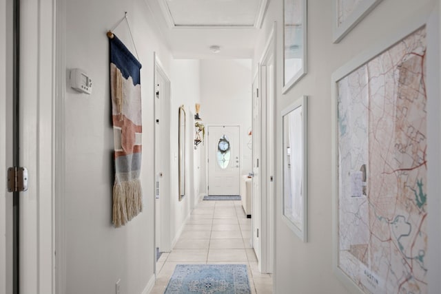 hallway featuring light tile patterned floors