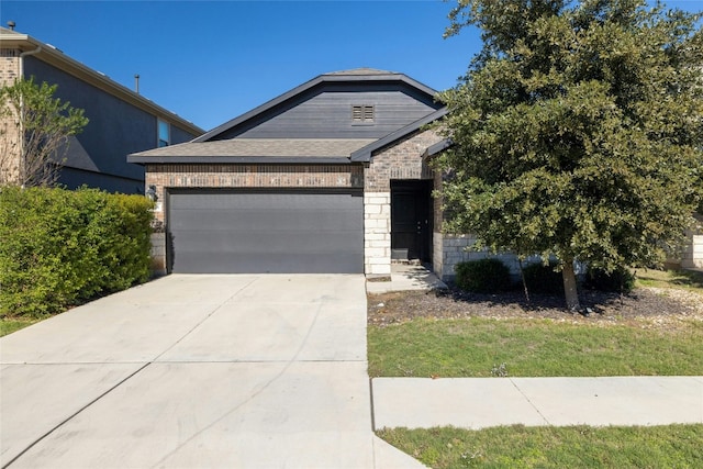 view of front of property with a garage