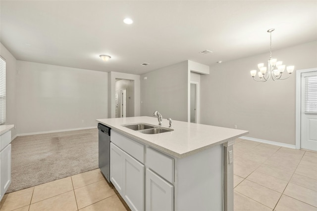 kitchen featuring white cabinetry, dishwasher, sink, hanging light fixtures, and light carpet