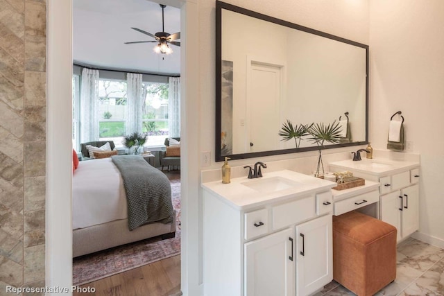 bathroom with vanity and ceiling fan