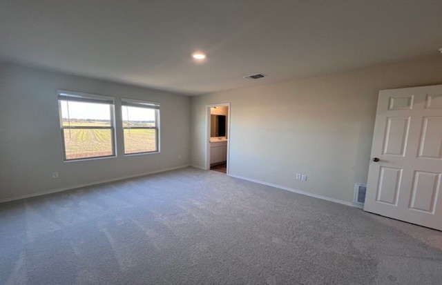 empty room with carpet floors