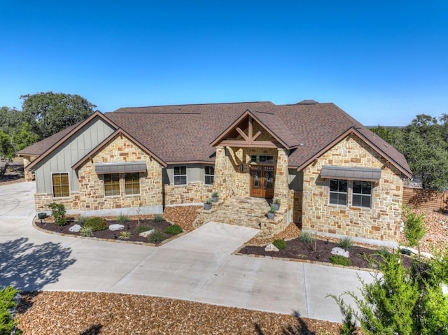 121 Winecup Ln, Spring Branch, TX 78070 - view of front of property featuring board and batten siding, stone siding, and roof with shingles