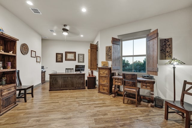 office featuring ceiling fan and light wood-type flooring