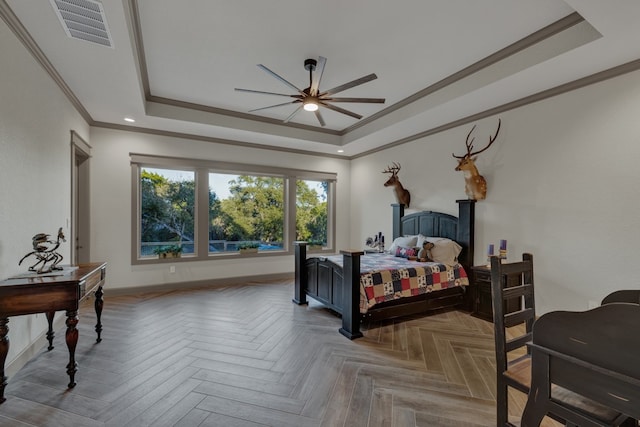 bedroom with a raised ceiling, ceiling fan, parquet floors, and ornamental molding