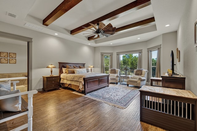 bedroom featuring beamed ceiling, wood-type flooring, and ceiling fan