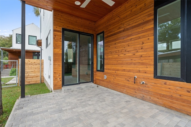 view of patio / terrace featuring ceiling fan