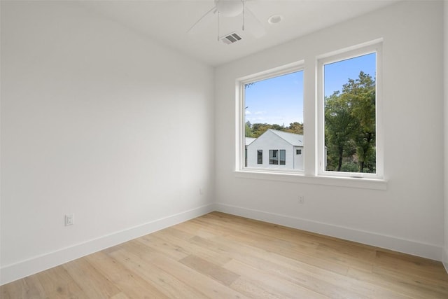 900 S 2nd St Unit 18, Austin, TX 78704 - empty room featuring baseboards, light wood-style flooring, and ceiling fan