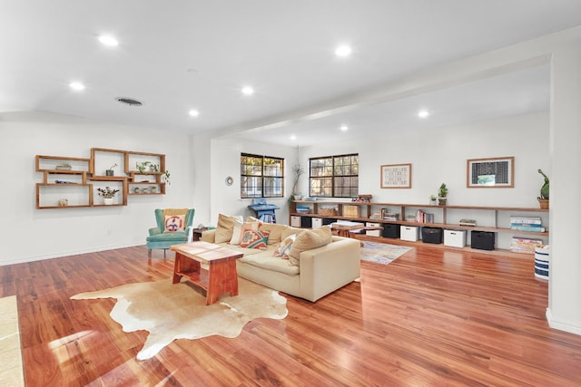 living room with light hardwood / wood-style flooring