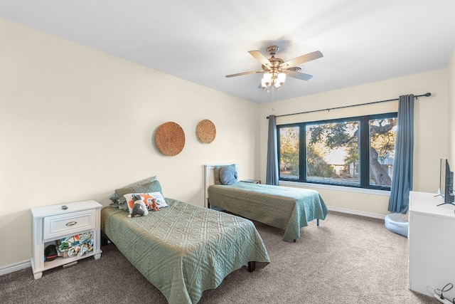 bedroom featuring ceiling fan and carpet floors