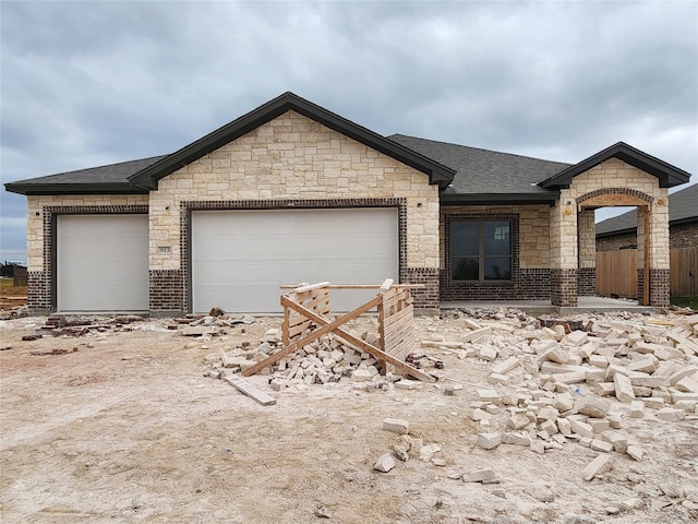 single story home featuring a garage