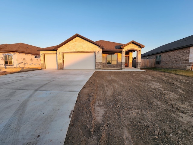 view of front of home with a garage