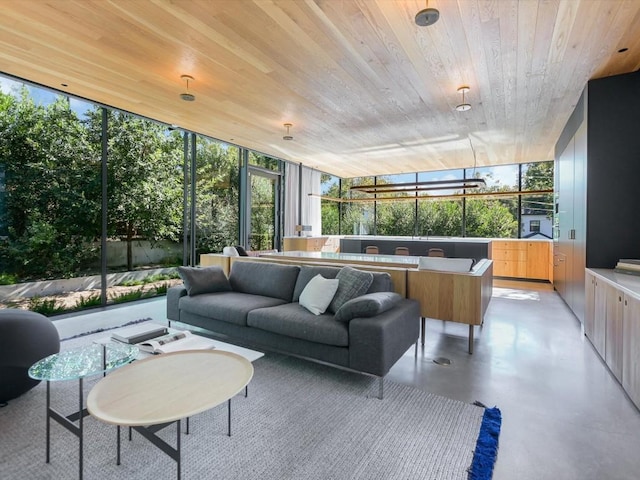 sunroom / solarium with wood ceiling