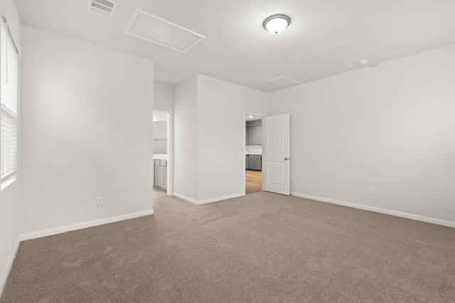 unfurnished room with carpet