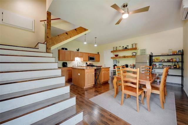 dining area featuring dark hardwood / wood-style flooring, a wall unit AC, ceiling fan, sink, and lofted ceiling