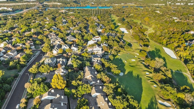 birds eye view of property with a residential view and a water view