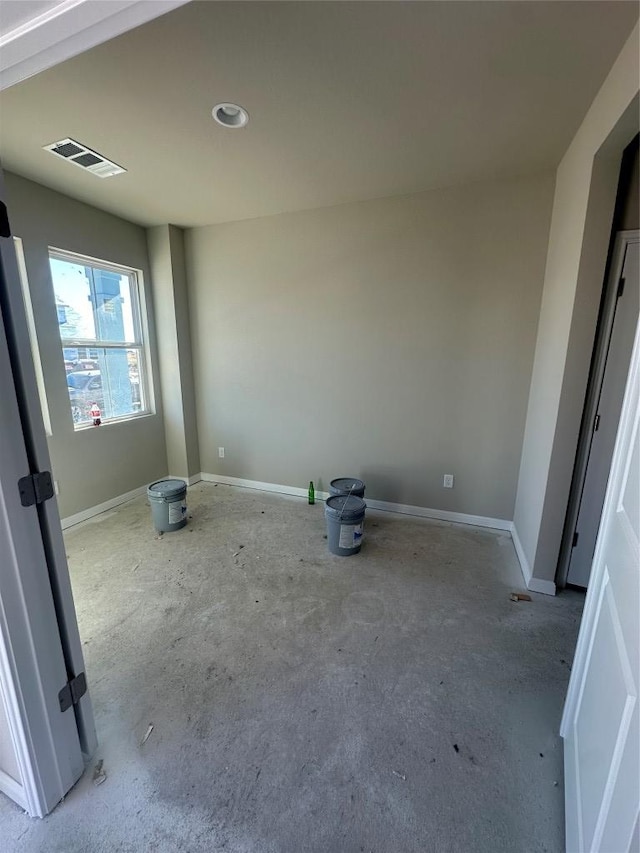 unfurnished bedroom with visible vents and baseboards