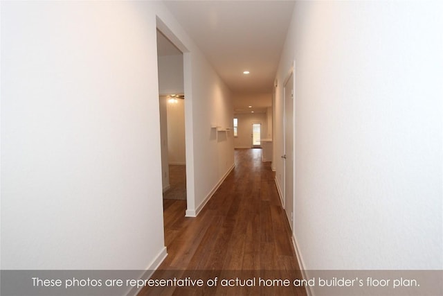 hallway featuring dark wood-type flooring